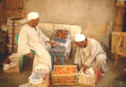 Vendedores de d&aacute;tiles en Assu&aacute;n, Egipto